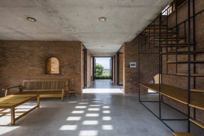 room with brick walls and minimal furniture