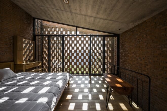 bedroom with perforated brick wall