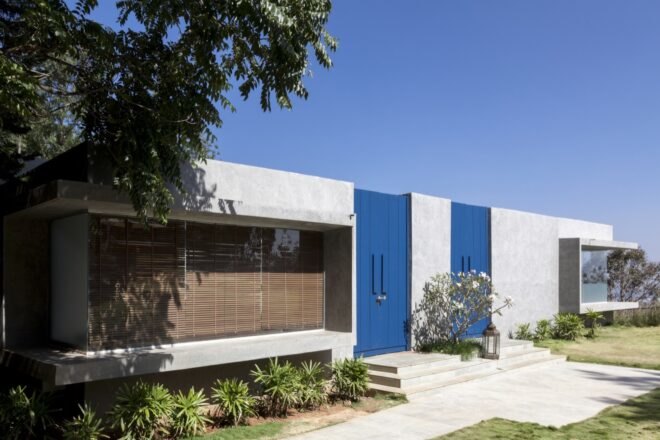 white building with large blue doors