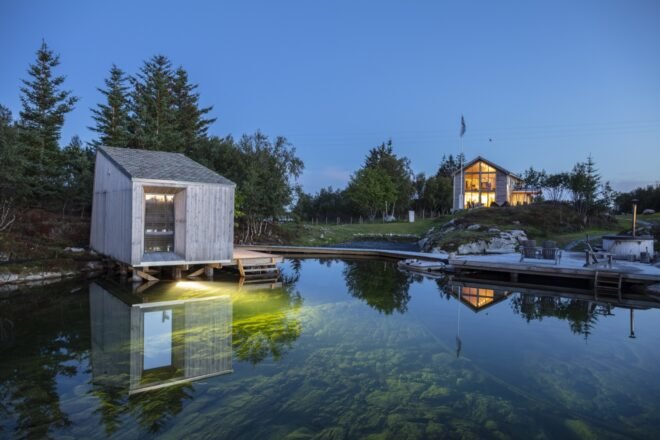 aluminum cabin beside water
