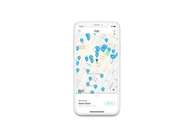 smartphone with app showing blue pinpoints on a map