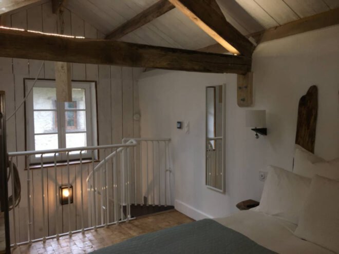 bedroom with vaulted ceiling