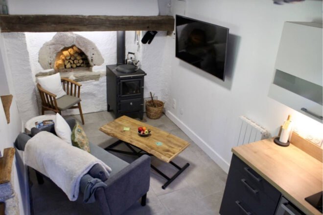 interior of tiny home with built-in chimney