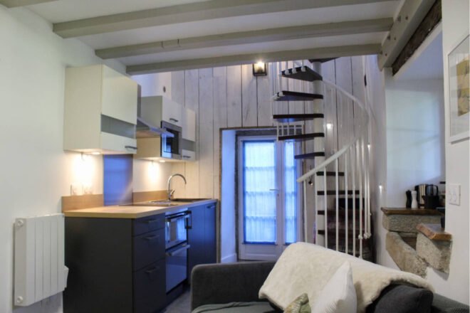 interior of tiny space with spiral staircase