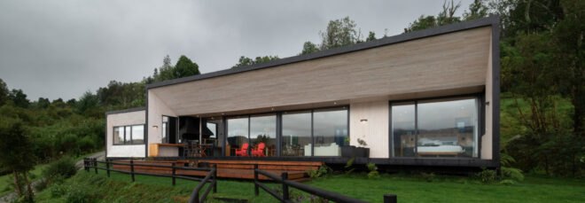 long light wood home with dark trim