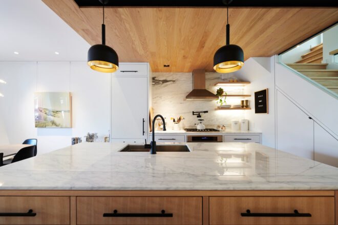 kitchen with wood cabinets and marble countertops