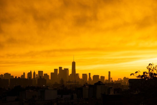 NYC skyline during orange sunset