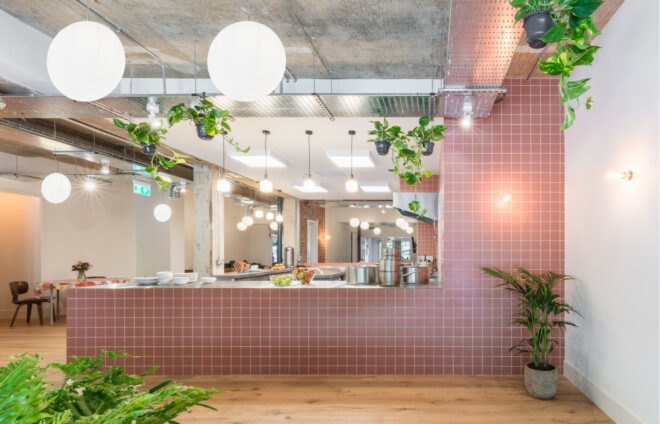 well-lit interior space with brick walls