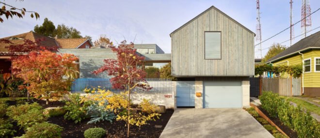 driveway leading up to pitched-roofed home