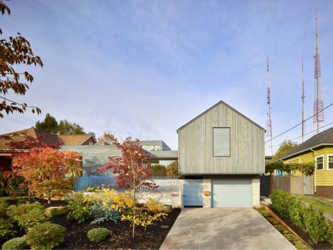 driveway leading up to pitched-roofed home