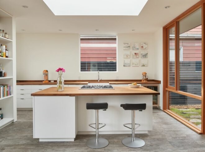 all white kitchen with large island