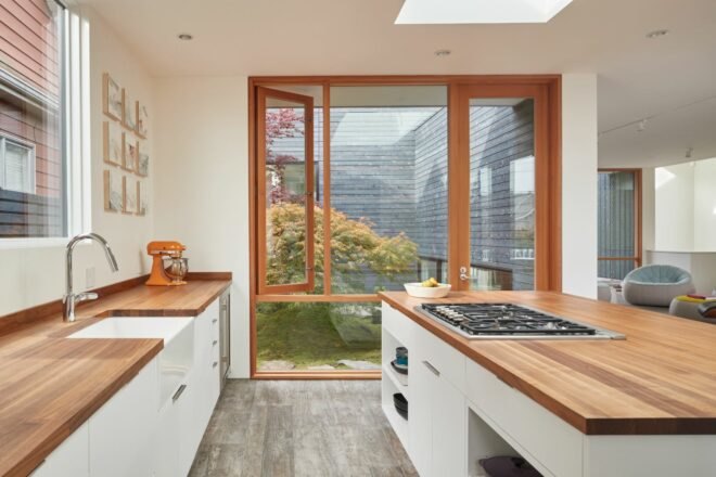 all white kitchen with large island