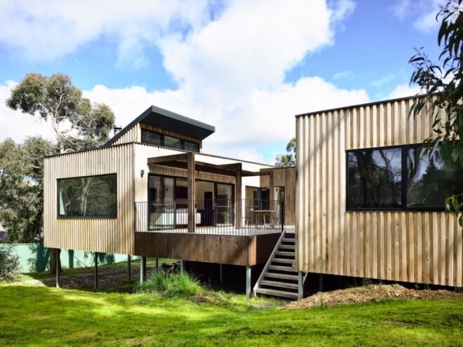 light timber home elevated off the ground
