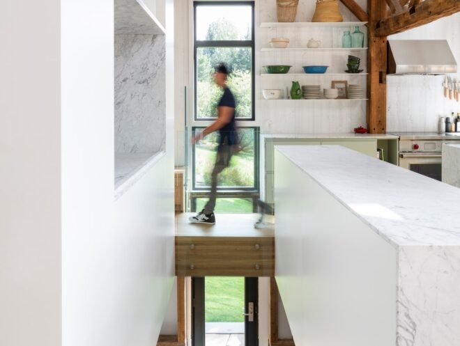figure walking over suspended walkway