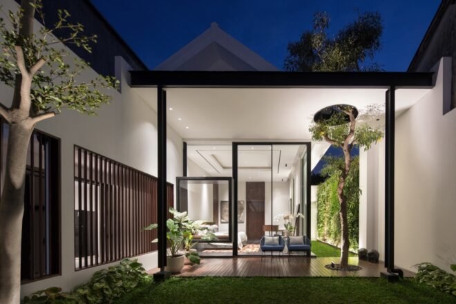 deck attached to living area with glass walls