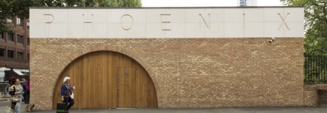 brick building with word "Phoenix" engraved across the top