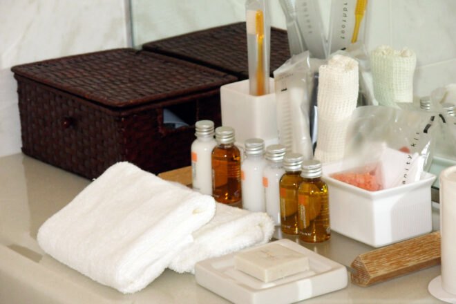 mini hotel toiletries on a sink