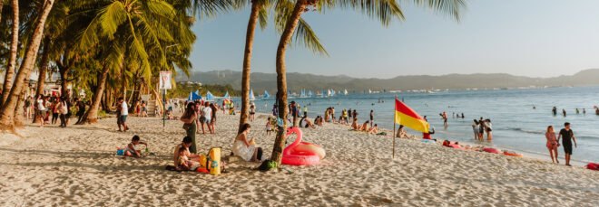 people playing on a beach
