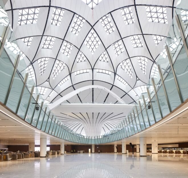 large airport terminal with several tiny skylights