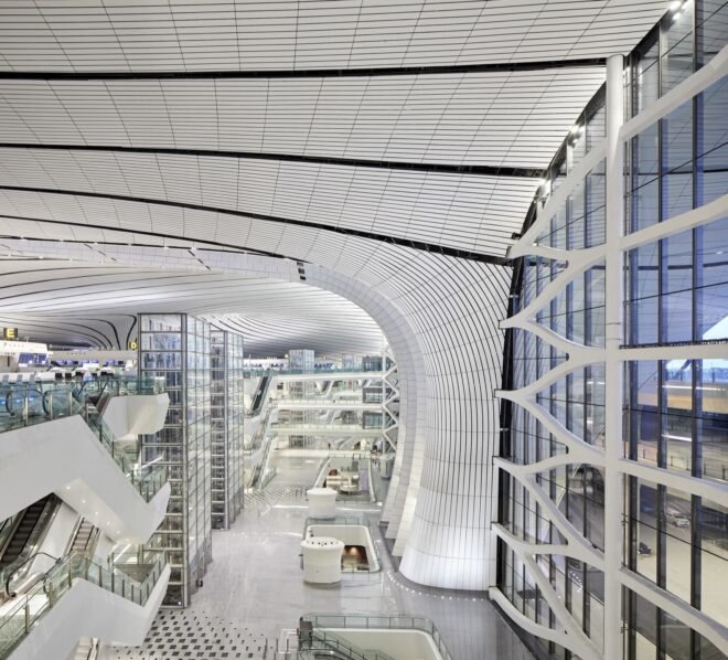 aerial view of white and glass airport terminal interior
