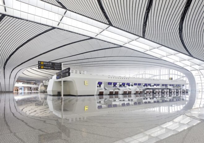 ticket counters inside a bright white airport