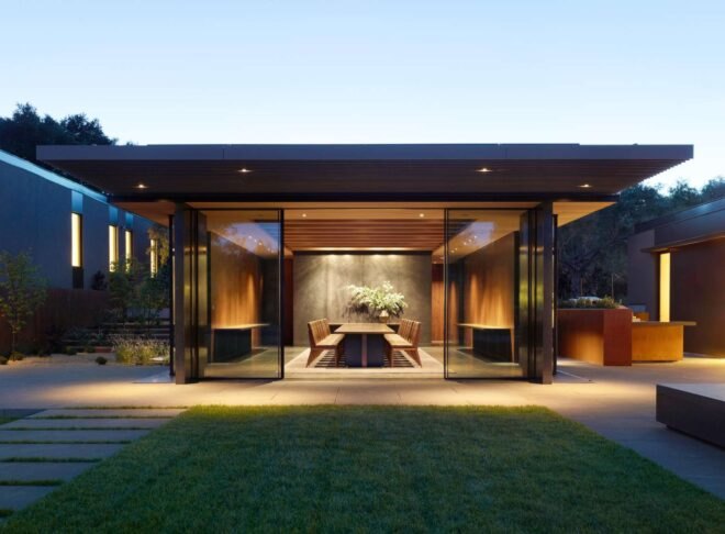 entrance to large home with glazed facades