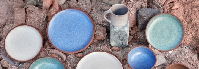 a collection of ceramic dinnerware