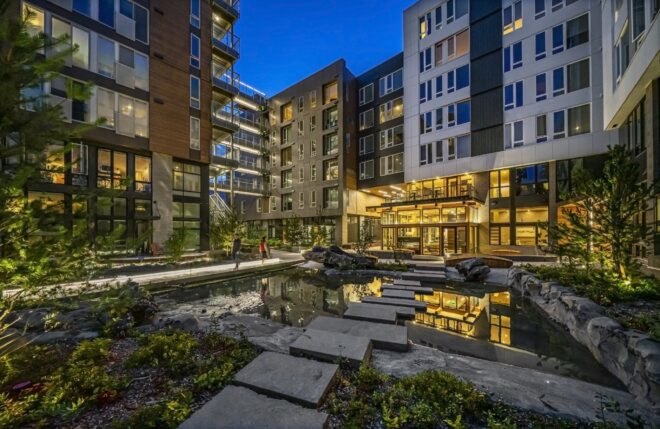 stone steps over a pond in a courtyard