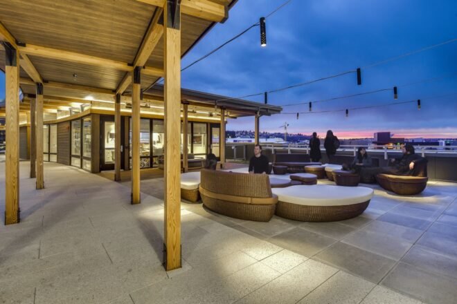 round chairs on an outdoor patio at dusk
