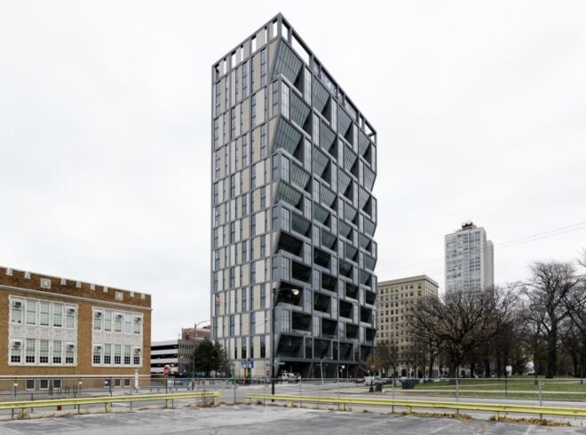 tall dark building with angular windows