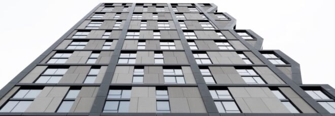 tall dark building with angular windows