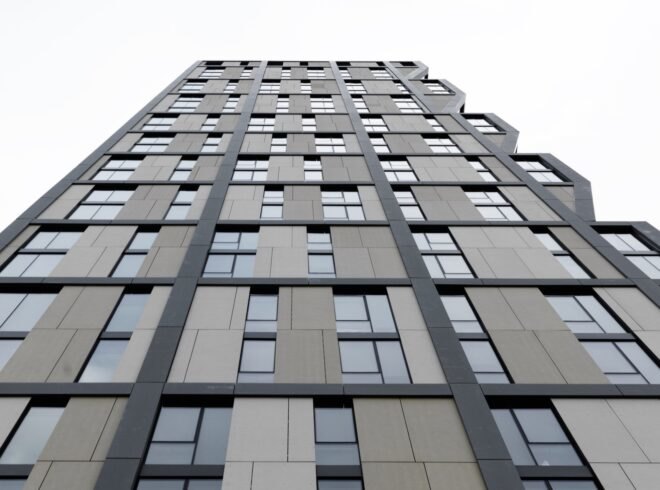 worm's eye view of dark tower office building