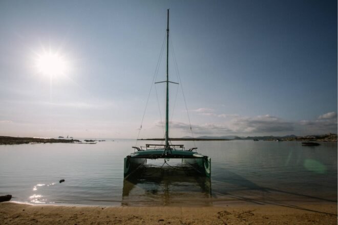 zero-emissions catamaran docked in the water
