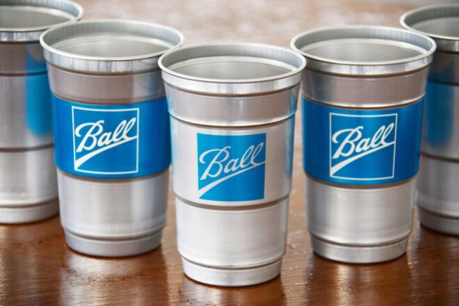 aluminum cups with blue Ball Corp. logo on the front