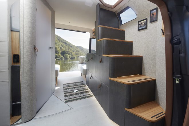 rendering of black staircase that doubles as storage inside a camper van