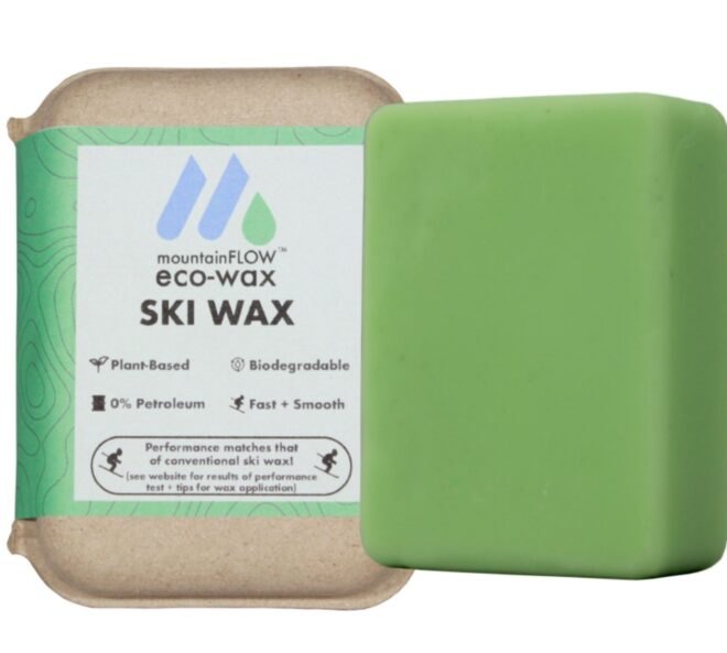 container and green bar of ski wax