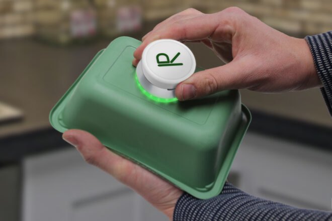 white device on a plastic container