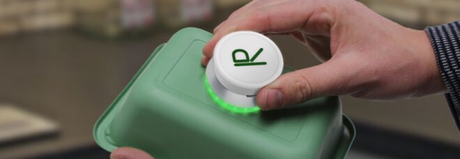 white device on a plastic container