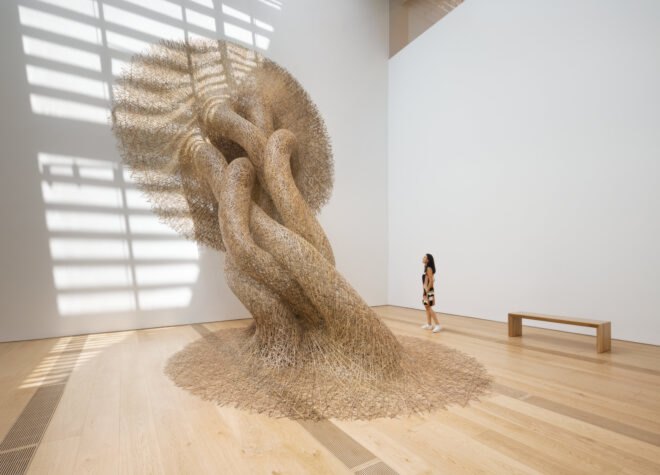large bamboo art installation in museum