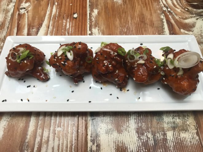 sweet-chili cauliflower on white plate