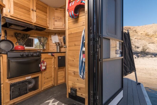 kitchen inside tiny house boat