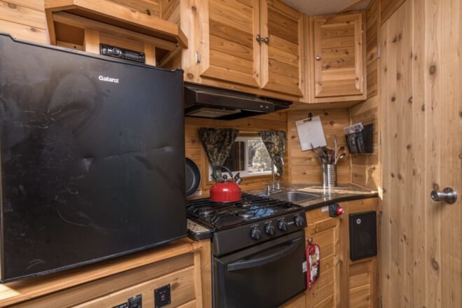 kitchen inside tiny house boat