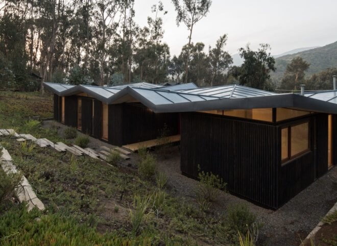 black home with zig zag metal roof