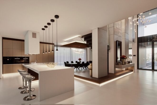 white kitchen island facing dark wood dining table