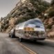 aluminum camper near a mountainside