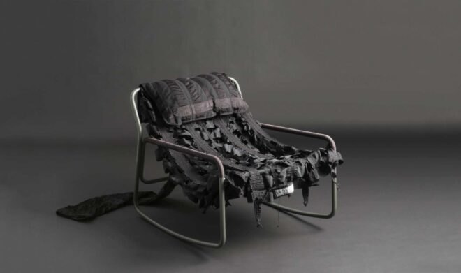 black and white photo of a single chair
