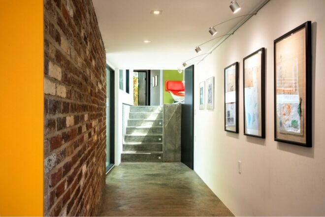 hallway with brick wall