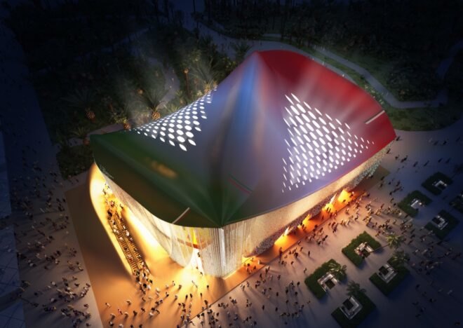 aerial view of curvy pavilion with red, white and green roof