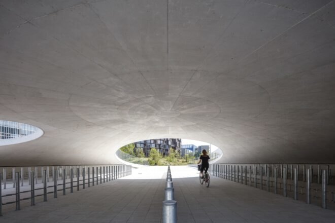 cave like structure that houses bicycles underneath