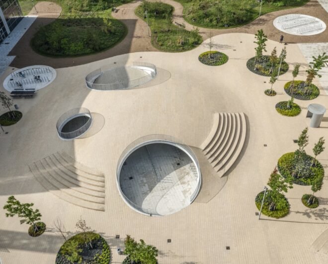 aerial view of cave like structure that houses bicycles underneath